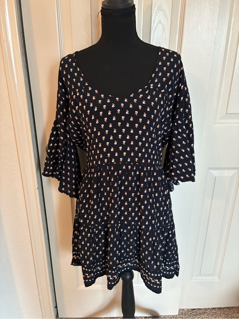100% Rayon Faithfull the Brand Navy Floral Scoop-Neck Peplum Tunic